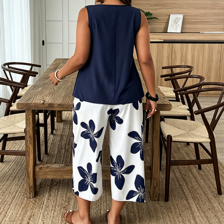 Marissa - Top asimétrico suave al tacto y conjunto con pantalones capri florales