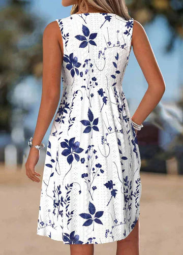 Tilly - Vestido corte A con detalle floral al frente