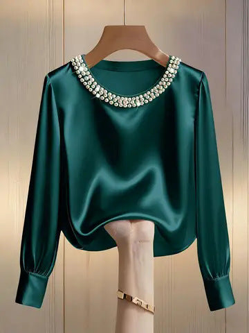 Avara - Blusa elegante con perlas
