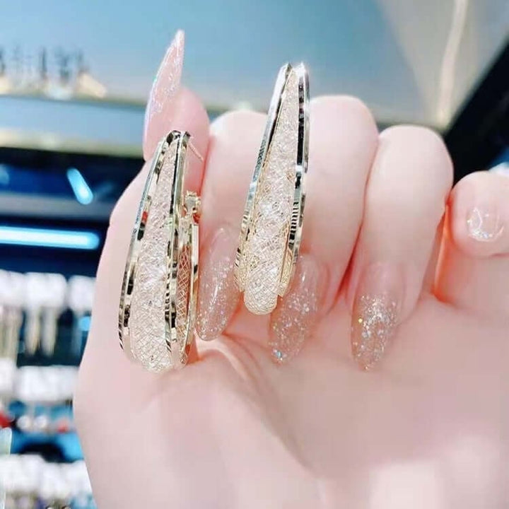 Ressa - Pendientes de Aro Ovalados Torcidos