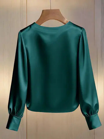 Avara - Blusa elegante con perlas