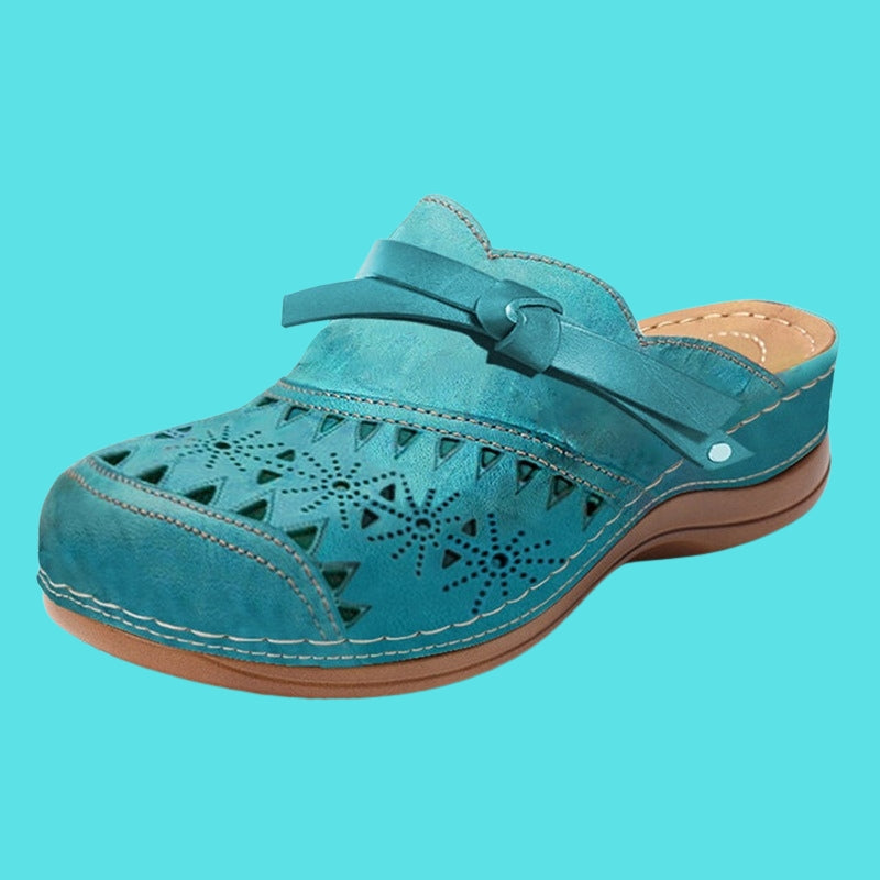 Aerina - Mules planas acolchadas