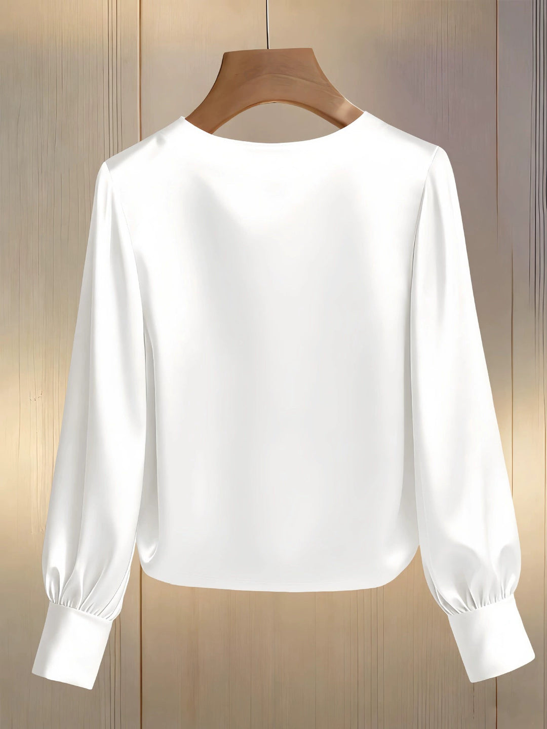 Avara - Blusa elegante con perlas
