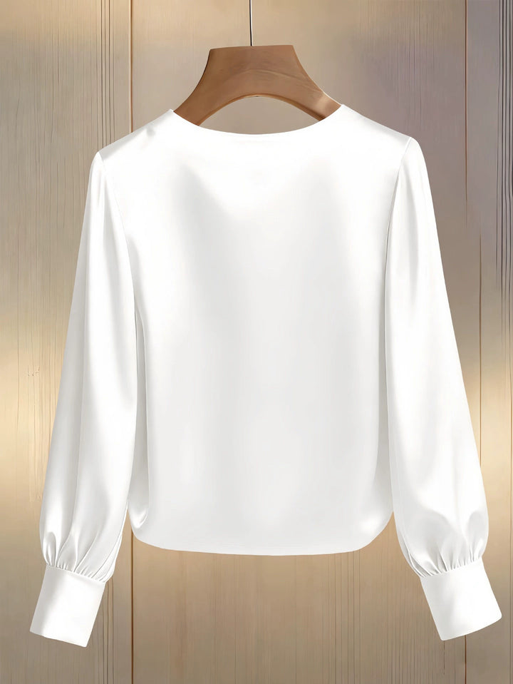 Avara - Blusa elegante con perlas