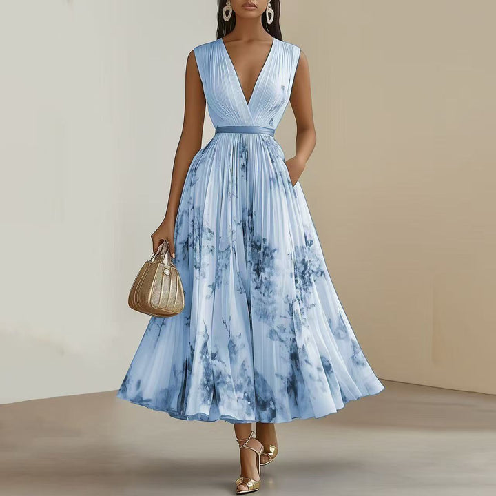 Nadia - Vestido midi plisado con estampado floral