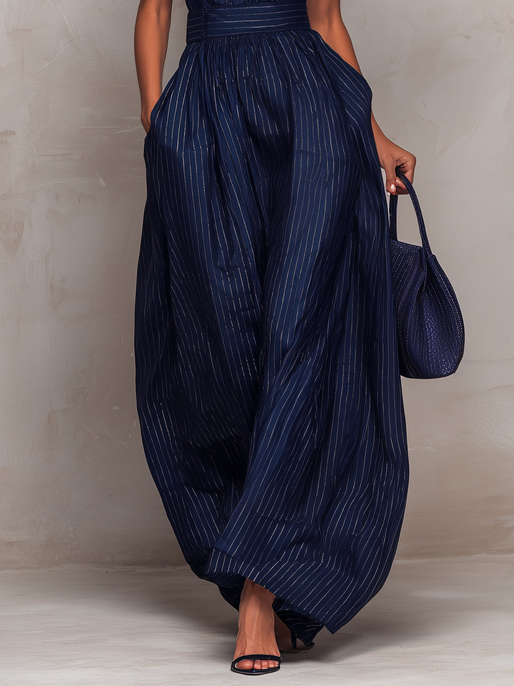 Iskra - Jumpsuit de cuello alto y pierna ancha