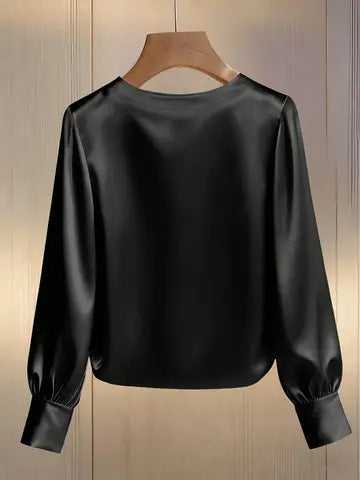 Avara - Blusa elegante con perlas