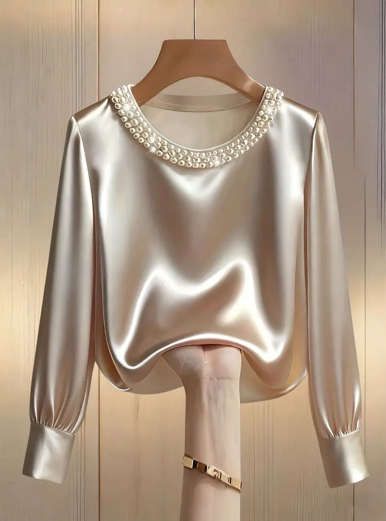 Avara - Blusa elegante con perlas