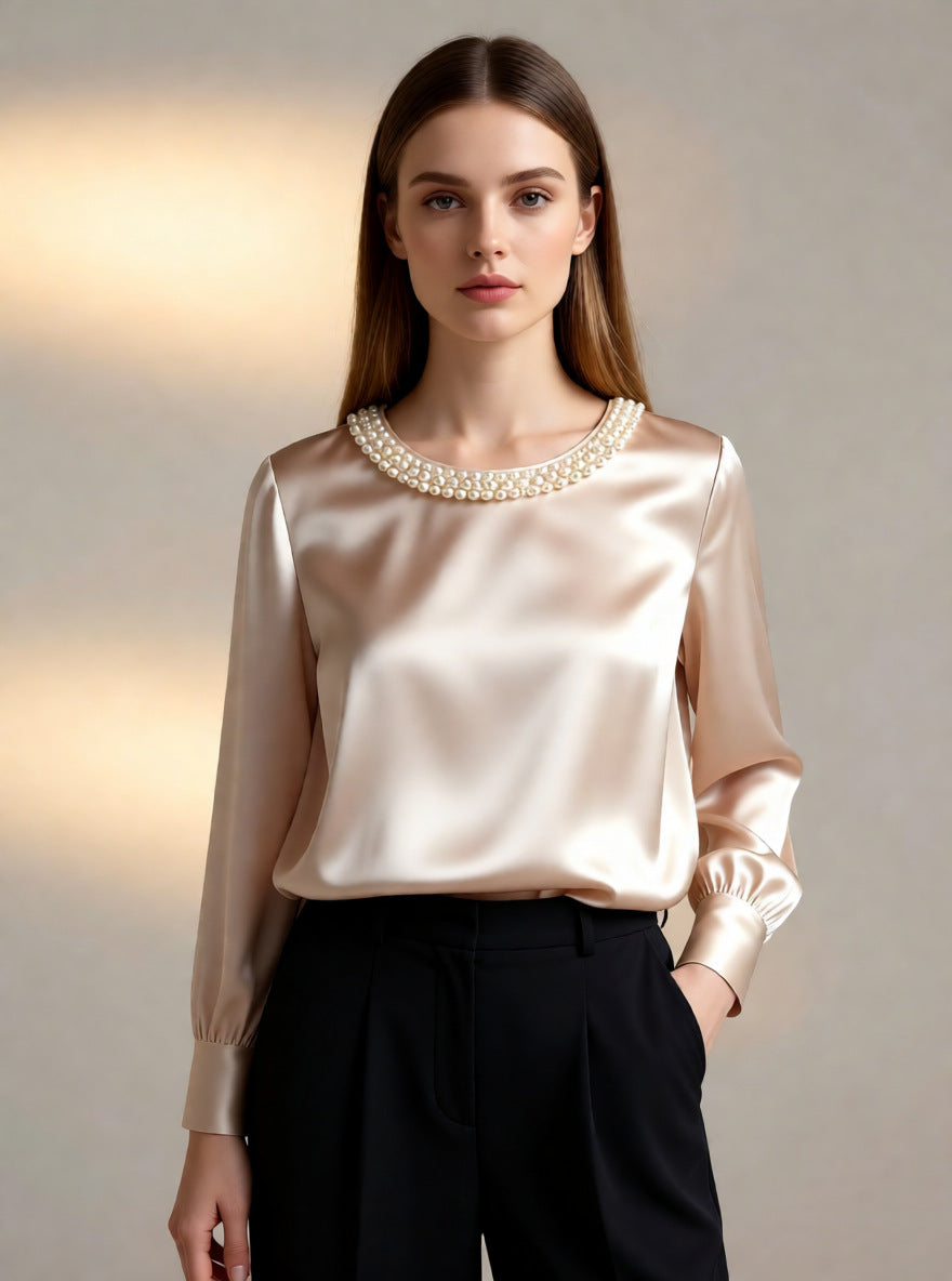 Avara - Blusa elegante con perlas