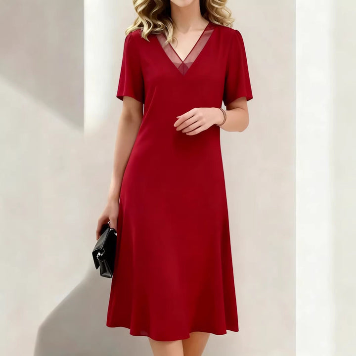 Brina - Vestido midi con escote en V y manga corta